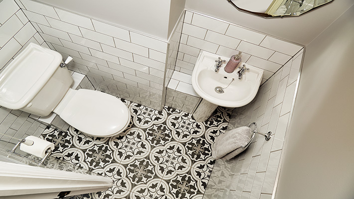 Contemporary cloakroom with patterned floor
