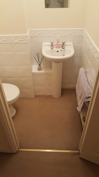 Contemporary cloakroom with patterned floor